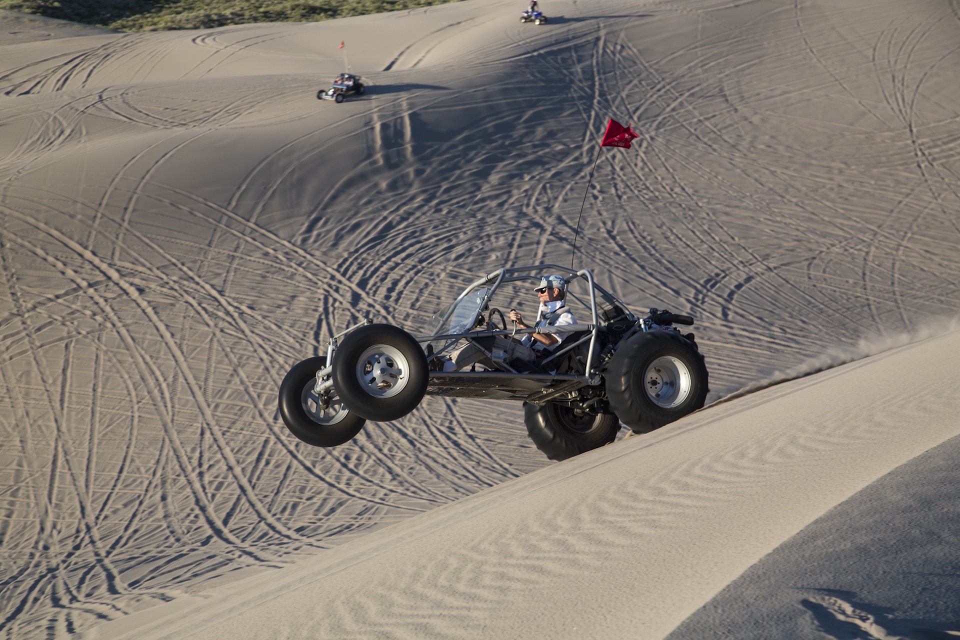Sand rail climbing a dune at Saint Anthony Sand Dunes